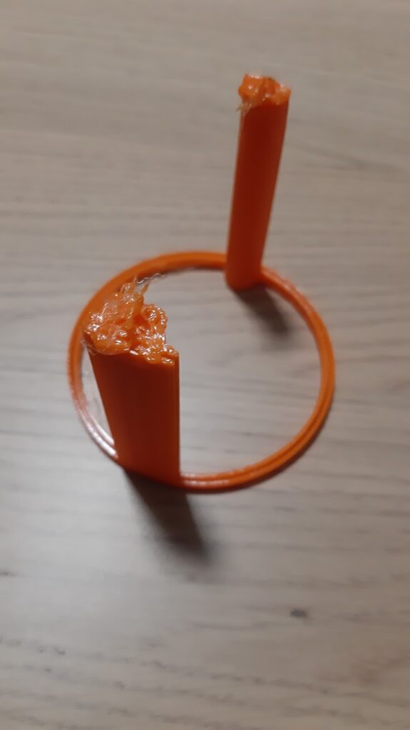failed print of dishwasher filter enclosure, orange tpu